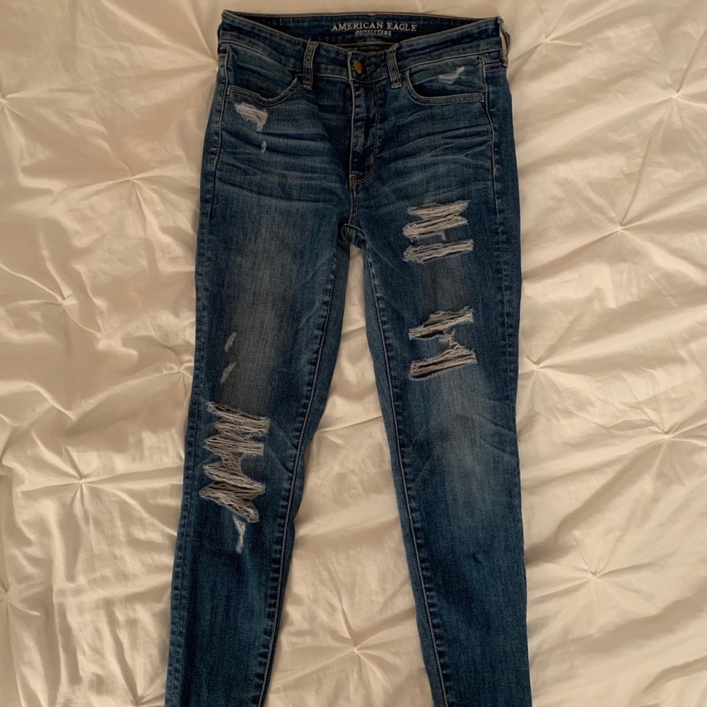 dark wash ripped american eagle jeans